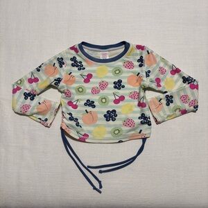 RuffleButts Girls' Long Sleeve Rash Guard Swimsuit Top | Fruit Print | Size 4T